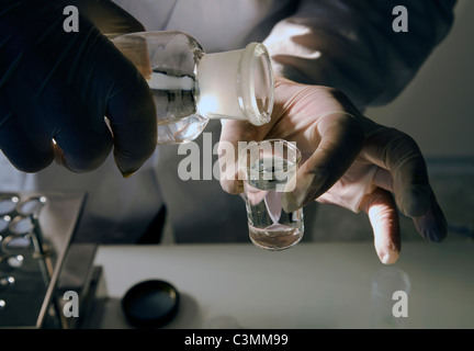 hand at work in laboratory Stock Photo
