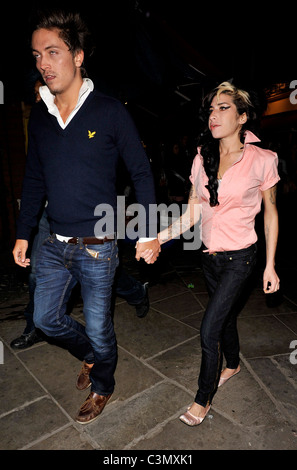 Tyler James and Amy Winehouse Amy Winehouse enjoying a night on the town with boyfriend Tyler James after leaving Pizza Express Stock Photo