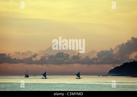 Indonesia, Island Bali, near Tejakula village, Gaia Oasis Resort. Sunrise. Fishermen. Stock Photo