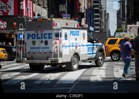 An NYPD Emergency Services Unit vehicle travels through Times Square in New York on Tuesday, May 10, 2011. (© Richard B. Levine) Stock Photo