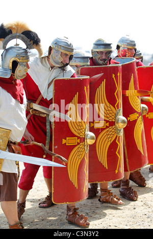 Roman Soldiers demonstrating attacking battle formation Stock Photo - Alamy