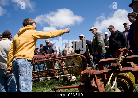 Young teen handles auction of farm equipment in Mohawk valley of central New York State Stock Photo