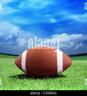 football on arena near the 50 yard line Stock Photo