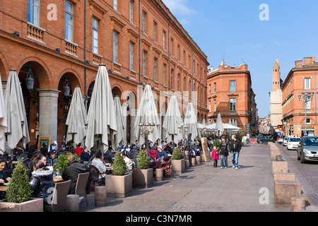 Sidewalk cafes in the Place du Capitole in the city centre, Toulouse, Languedoc, France Stock Photo