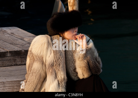 Wealthy tourist sitting down outside the Danieli hotel, Venice, Italy Stock Photo