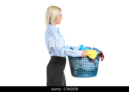 Young woman carrying a laundry basket Stock Photo
