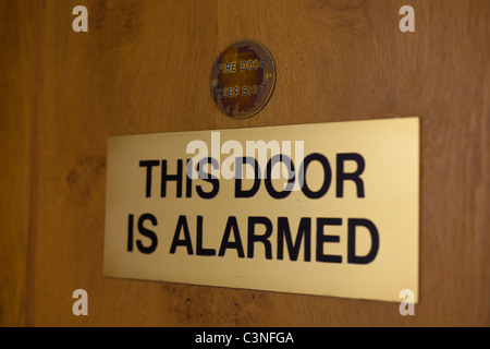 This door is alarmed Stock Photo