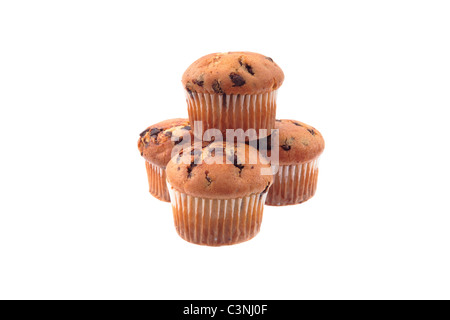 Many chocolate muffins stacked and isolated on a white background Stock Photo