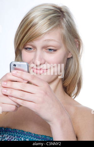 Young Blond Woman on Mobile Phone Stock Photo