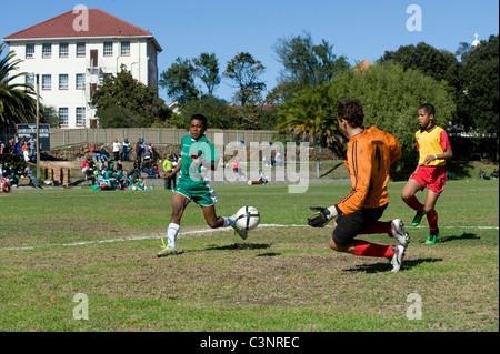 Goalkeeper and striker of an U13 football team in action Cape Town South Africa Stock Photo
