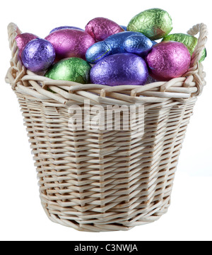Basket filled with chocolate eggs Stock Photo