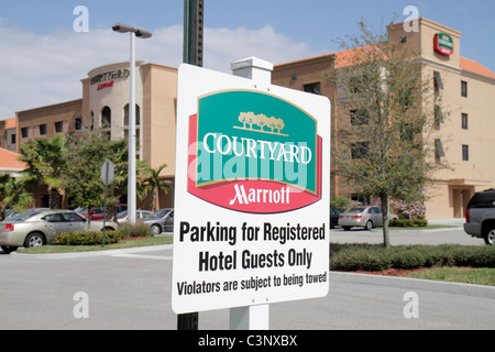 Stuart Florida,Courtyard Marriott,hotel hotels lodging inn motel motels,lodging,parking lot,building,front,entrance,sign,logo,guests only,towing,warni Stock Photo