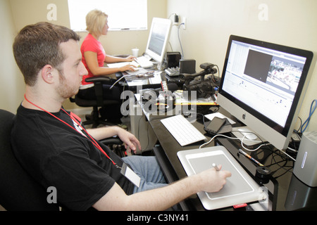 Florida,Hillsborough County,Plant City,Florida Strawberry Festival,FOCUS TV,man men male,woman female women,computer,monitor,graphics tablet,electroni Stock Photo