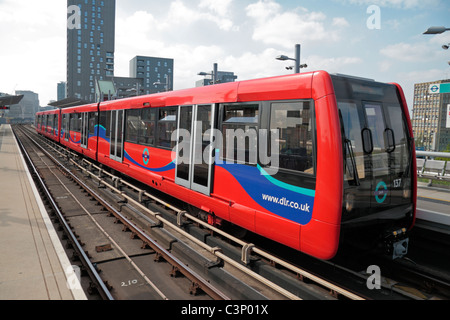 A Docklands Light Railway (DLR) train pulling in to Blackwall station, Isle of Dogs, London, UK. Stock Photo