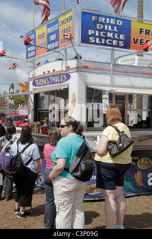 Florida,Hillsborough County,Plant City,Florida Strawberry Festival,carnival,food,overweight obese obesity fat heavy plump rotund stout,woman female wo Stock Photo
