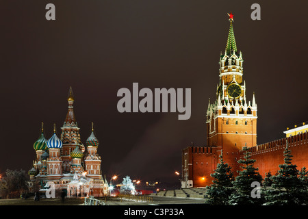 Spassky Tower of Moscow Kremlin and St. Basil's Cathedral on Red Square at night. Moscow, Russia. Stock Photo