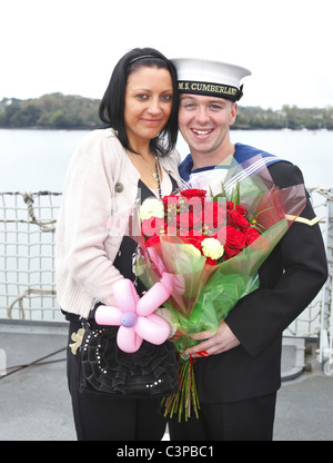 A sailor proposes to his girlfriend on his return to port in Devonport, UK. Stock Photo