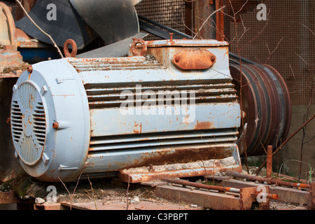 Old electric motor with belt drive Stock Photo