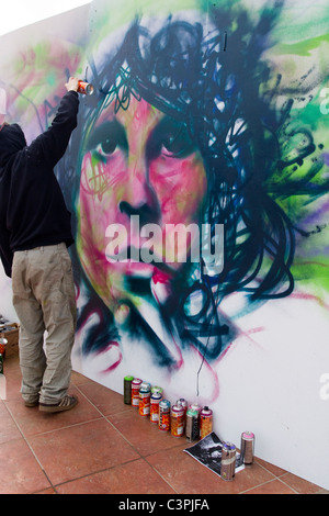 Creating Design   Designing Graffiti Artist at work at the Southport Jam Legal Wall  UpNorthFest  Merseyside, UK Stock Photo