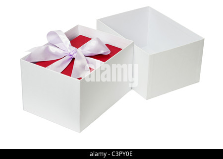 Red gift box with bow ribbon inside open white container Stock Photo