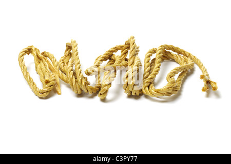 Loose brown synthetic fiber rope spreaded out on white background Stock Photo