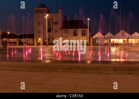 Pink lights in water fountain UK holiday UK tourist attraction Stock Photo