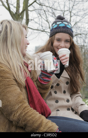 2 young women with take away cups Stock Photo