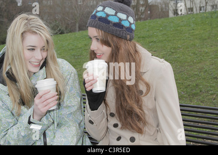 2 young women with take away cups Stock Photo