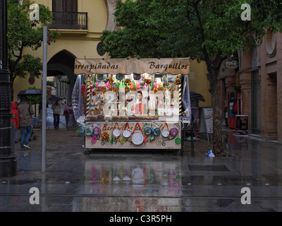 A kiosk selling sweets during a thunderstorm in Seville, Spain.