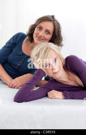 Germany, Leipzig, Young women smiling, portrait Stock Photo