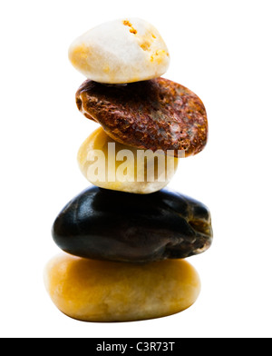 Stack of assorted stones isolated over white Stock Photo