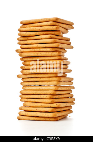 salty crackers pile isolated on white background Stock Photo