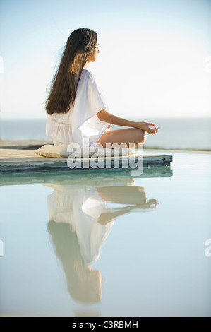 Woman meditating Stock Photo
