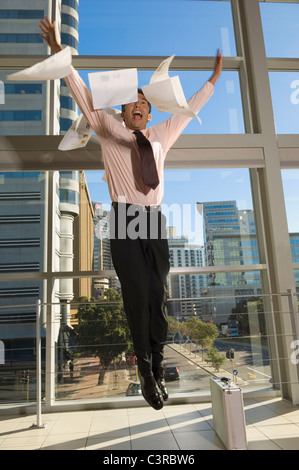 Business man jumping in the air Stock Photo