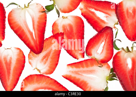 Back projected appetizing strawberry slices. Stock Photo