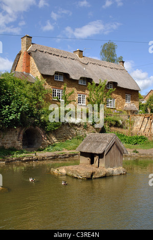 The village duckpond, Wroxton, Oxfordshire, England, UK Stock Photo