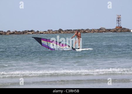 Senior man windsurfing Stock Photo