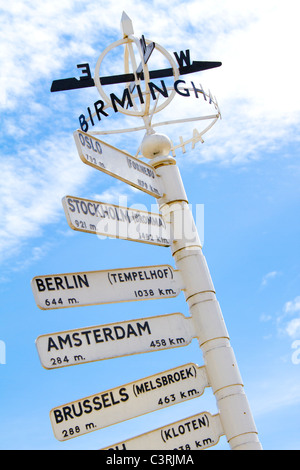 Finger post at Birmingham International Airport highlighting international travel destinations. Stock Photo