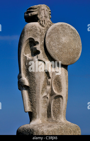 Spain, Galicia: Statue of celtic king Breogan made by Jose Cid in front of the Hercules Tower in  A Coruna Stock Photo