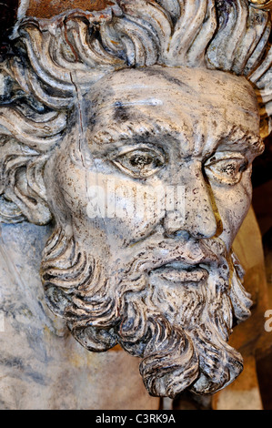 Spain, Santiago de Compostela: Detail of "Atlas" carrying a medieval pulpit  in the library of the Cathedral´s museum Stock Photo