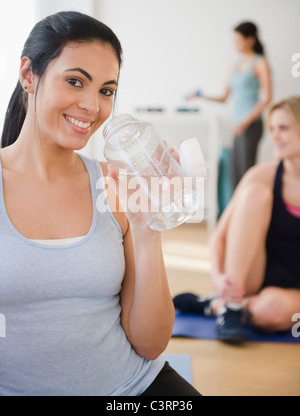 Women relaxing after exercise Stock Photo