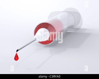 Injection with red drop on needle Stock Photo