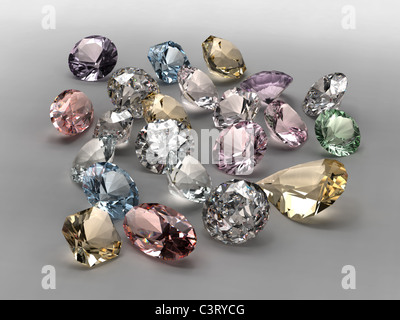 Shiny diamonds in different shapes and colors on gray background Stock Photo