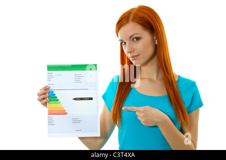 Young woman with an Energy Performance Certificate Stock Photo