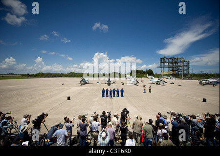 Astronauts Arrive for Launch Media gather at Kennedy Space Center's Shuttle Landing Facility to see the STS-134 astronauts following their arrival in T-38 jets. The six astronauts for space shuttle Endeavour's final flight are preparing for a 14-day mission to the International Space Station.From left are Mission Specialists Greg Chamitoff, Andrew Feustel, Kelly, Pilot Greg H. Johnson, Mission Specialist Mike Fincke and European Space Agency astronaut Roberto Vittori. Image credit: NASA/Bill Ingalls April 26, 2011 Stock Photo