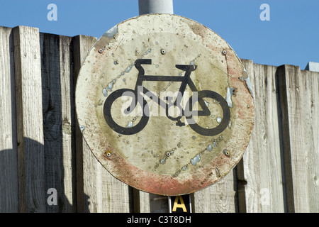 Dirty old no cycling sign close up. Stock Photo