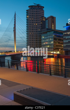New swing bridge (2011) Salford Quays.The footbridge will link Media City UK to the Imperial War Museum Stock Photo