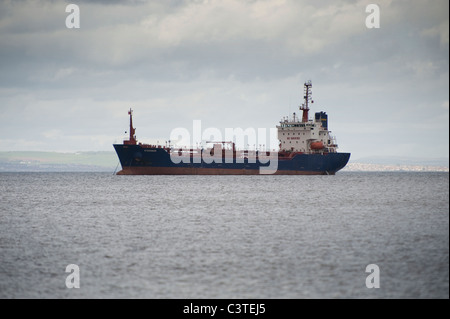 Oil tanker anchored off coast of Isle of Arran near Brodick. Stock Photo