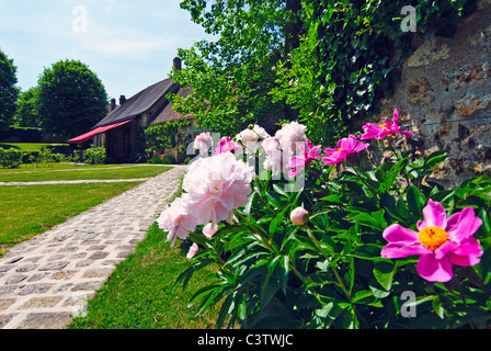 The garden of the Duke and Duchess of Windsor's country home Le Moulin de la Tuilerie in Gif sur Yvette, France Stock Photo