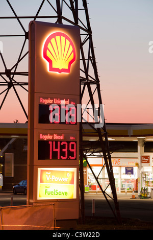 A petrol sation in Billingham on Teeside, UK, with an electricity pylon at dusk. Stock Photo